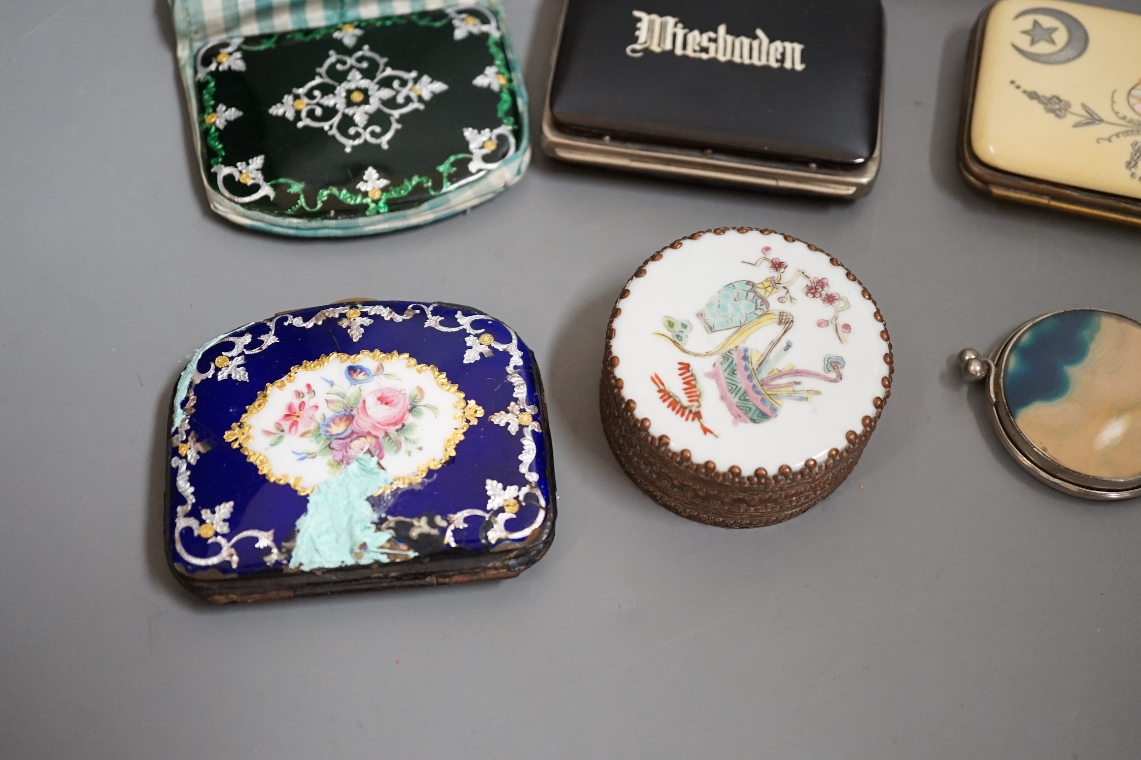 A mixed collection of enamel, tortoiseshell and other purses, a Chinese porcelain box and enamel topped box